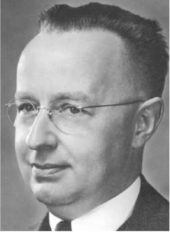 Black and white portrait of Walter Shewhart in round glasses, a dark suit and a tie.
